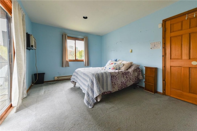 carpeted bedroom with baseboard heating