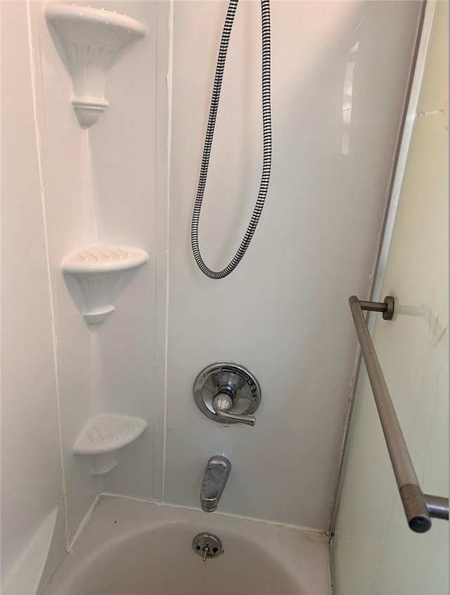 bathroom featuring tub / shower combination