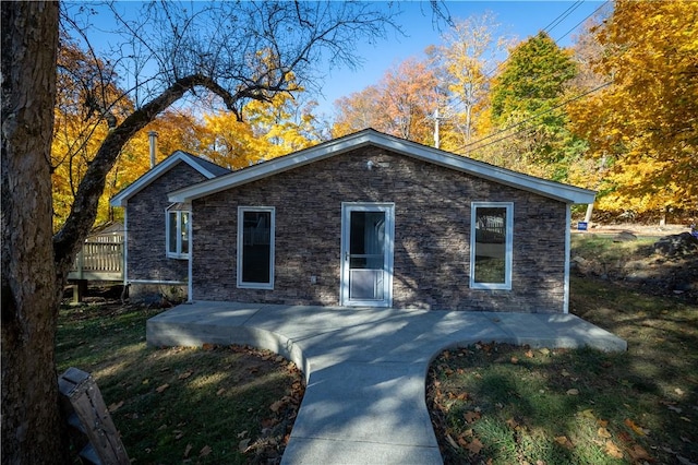 view of front facade featuring a wooden deck