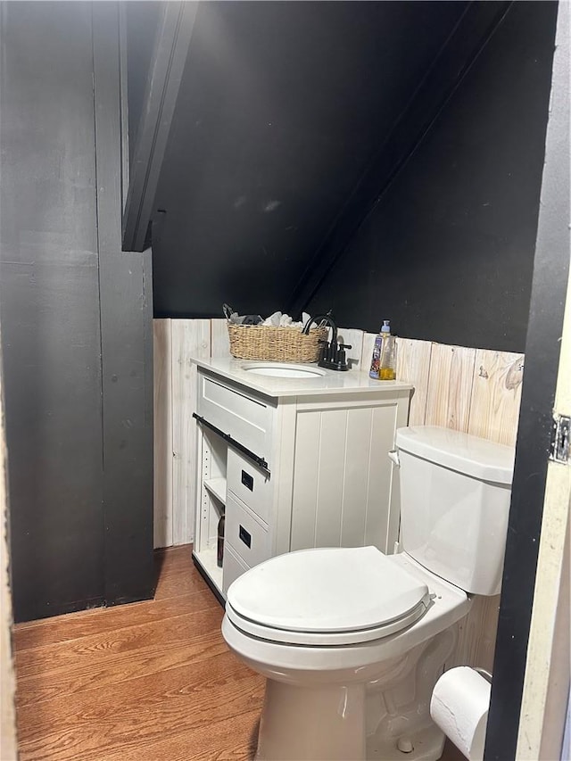 bathroom with wood walls