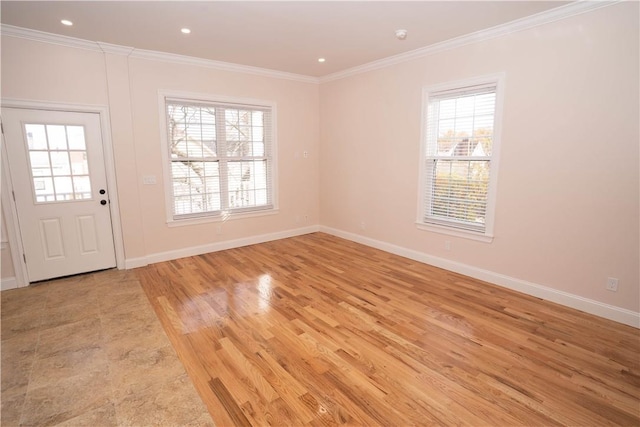 entryway featuring light hardwood / wood-style flooring and crown molding