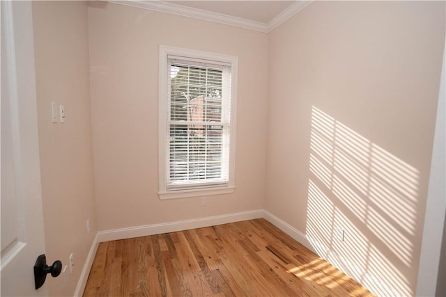 unfurnished room with crown molding and light wood-type flooring