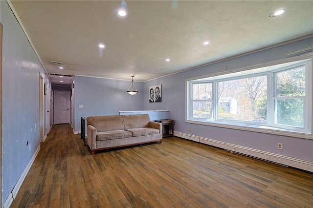 living room featuring wood-type flooring and a baseboard radiator