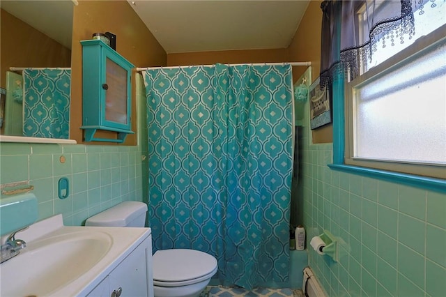 bathroom featuring vanity, toilet, tile walls, a baseboard radiator, and curtained shower