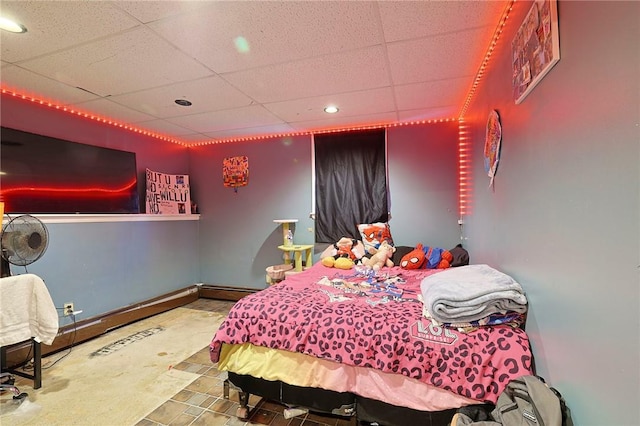 bedroom with a paneled ceiling