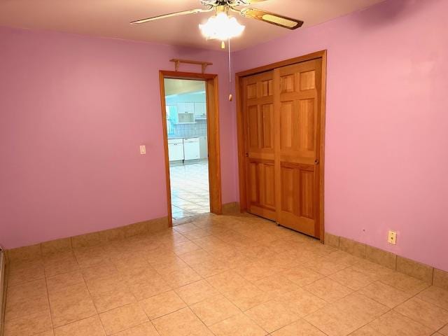 spare room featuring ceiling fan