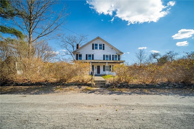 view of front of house with covered porch