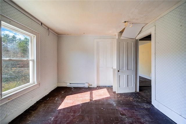 spare room with a baseboard radiator