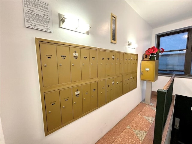 view of home's community featuring mail boxes