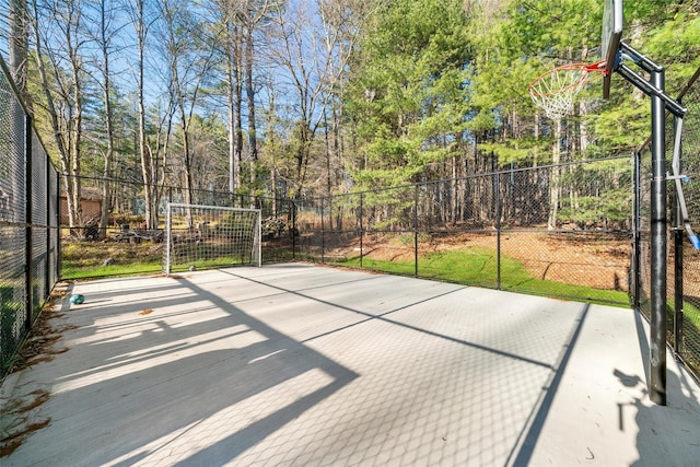 view of patio / terrace featuring basketball hoop