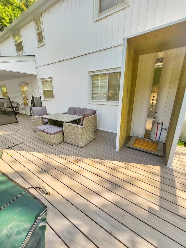 deck with an outdoor hangout area