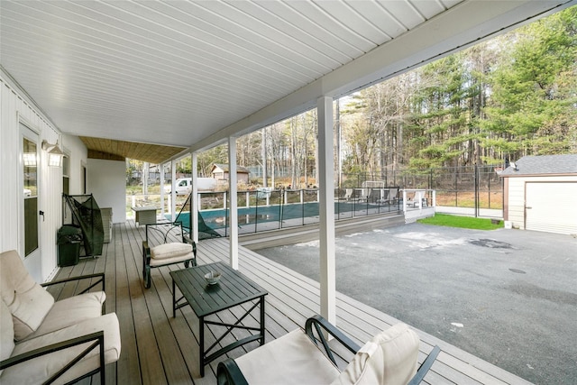 wooden terrace featuring an outdoor hangout area