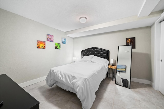 bedroom with a textured ceiling