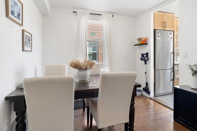 dining room featuring dark wood-type flooring