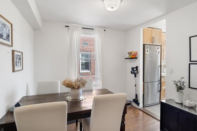 dining room with light hardwood / wood-style flooring