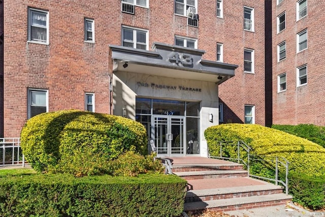 view of exterior entry featuring french doors