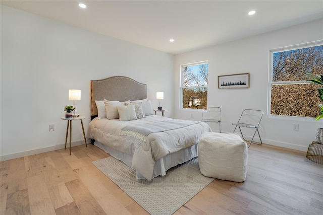 bedroom featuring light hardwood / wood-style floors