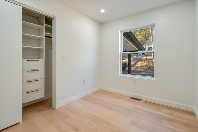 unfurnished bedroom featuring light hardwood / wood-style floors