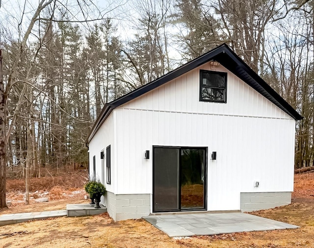 rear view of house featuring a patio