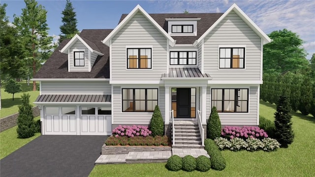 view of front facade with a front yard and a garage