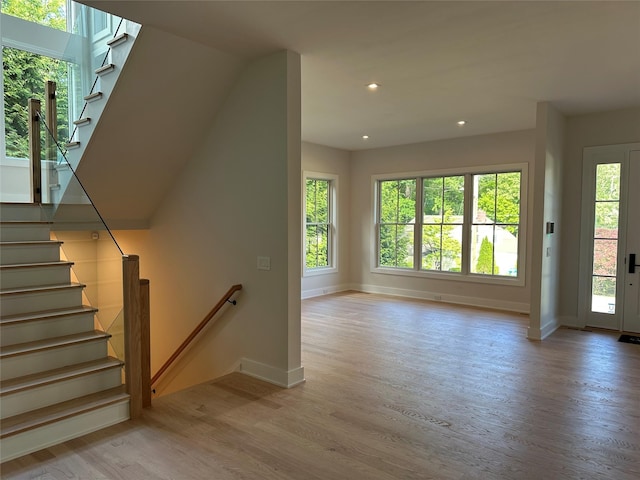 239 Rock Creek Ln, Scarsdale, NY 10583 - staircase with wood finished floors, baseboards, and recessed lighting