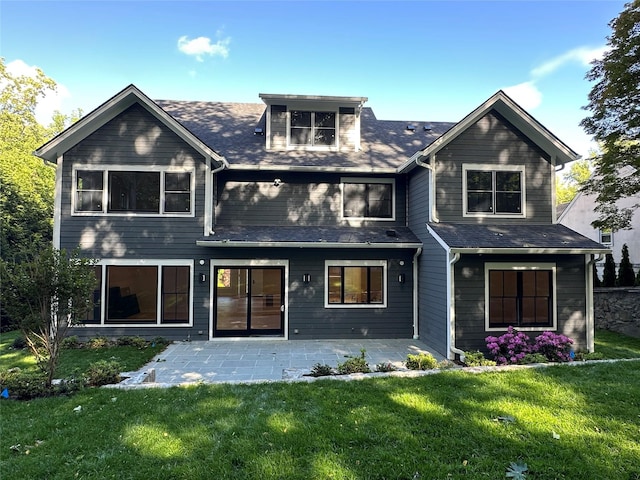 239 Rock Creek Ln, Scarsdale, NY 10583 - back of house with a lawn, a patio, and roof with shingles
