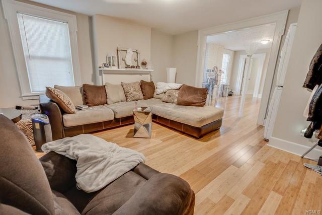 living room with light hardwood / wood-style floors