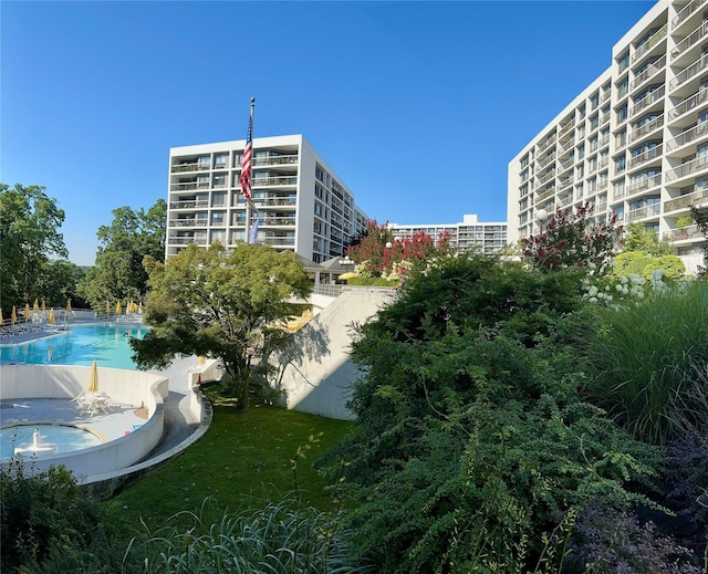 view of property with a community pool