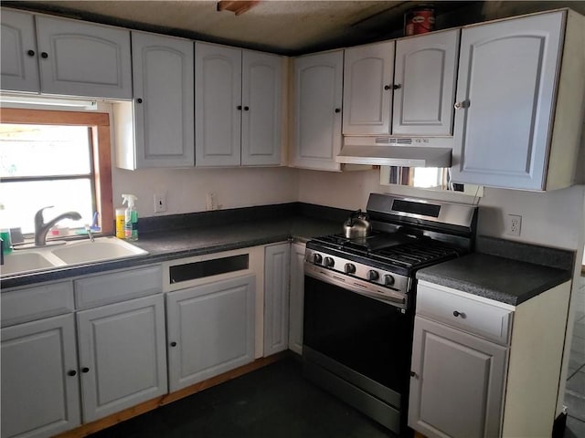 kitchen with white cabinets, stainless steel gas range oven, and sink