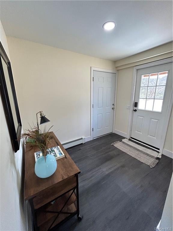 7065 Rte 209, Kerhonkson, NY 12446 - foyer entrance featuring baseboard heating, baseboards, dark wood-style floors, and recessed lighting