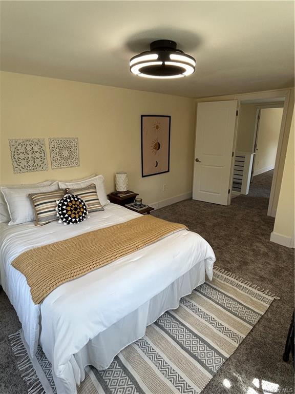 bedroom featuring carpet flooring