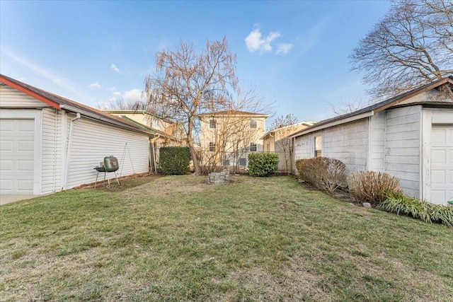 view of yard featuring a garage