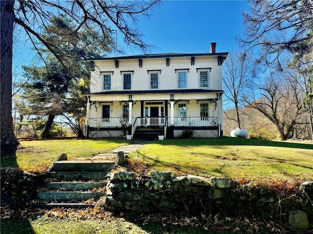 italianate home with a front yard and covered porch