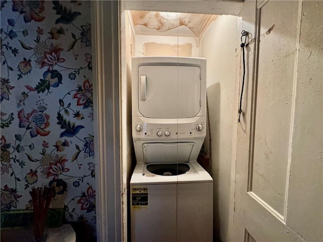 laundry room featuring stacked washer / dryer