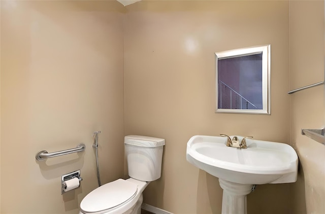 bathroom featuring toilet