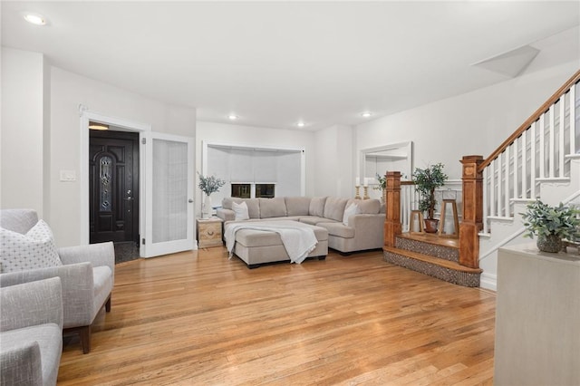 living room with light hardwood / wood-style floors