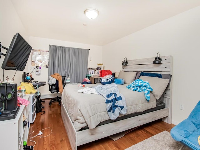 bedroom featuring hardwood / wood-style flooring