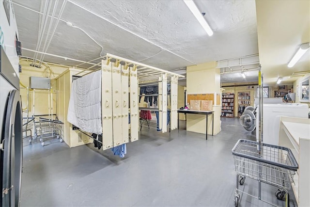 basement featuring washing machine and dryer