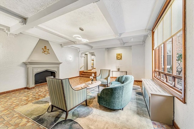 interior space featuring beamed ceiling and a textured ceiling