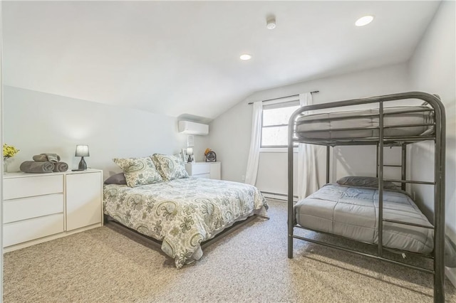 bedroom with baseboard heating, a wall unit AC, carpet, and vaulted ceiling