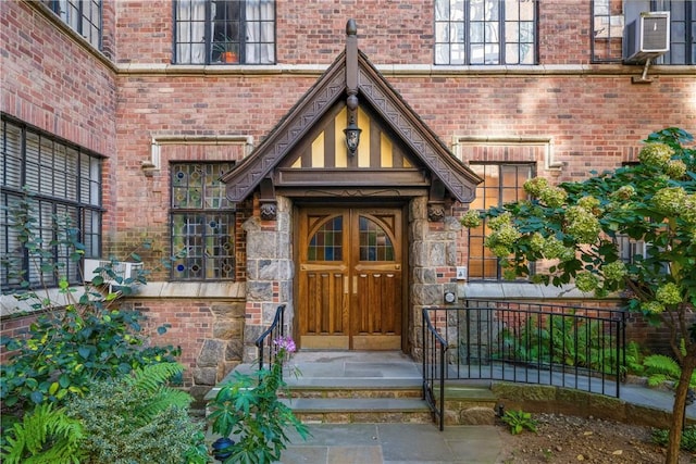 doorway to property featuring cooling unit