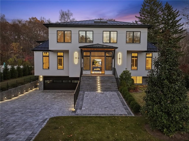 view of front of property featuring a garage