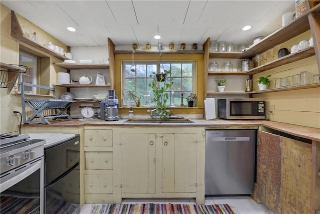 kitchen featuring appliances with stainless steel finishes and sink