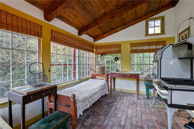 bedroom featuring multiple windows, wooden ceiling, and vaulted ceiling with beams