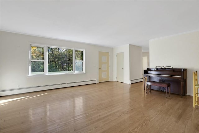 unfurnished living room with a baseboard radiator, light hardwood / wood-style flooring, and ornamental molding