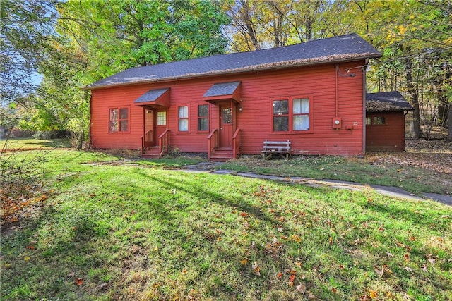 view of front of house with a front lawn