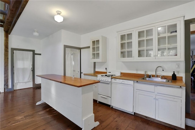 kitchen featuring white cabinetry, sink, white appliances, and wood counters