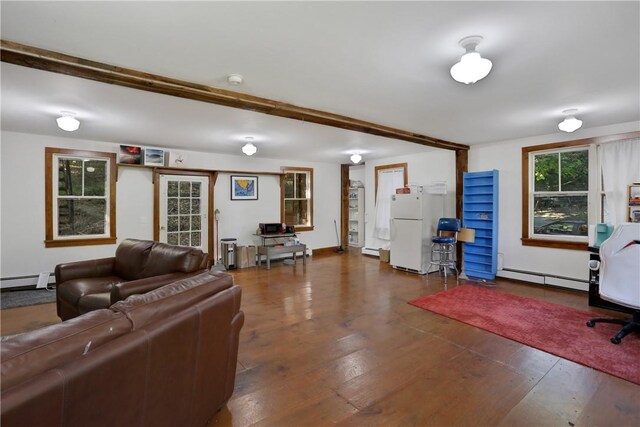 living room with baseboard heating and dark wood-type flooring