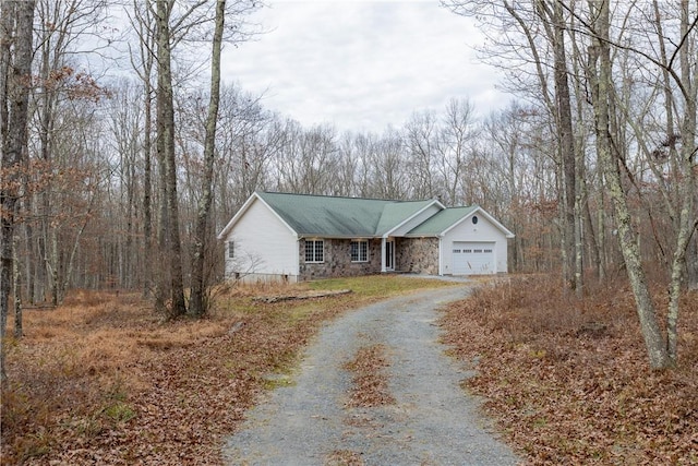 view of front of property featuring a garage