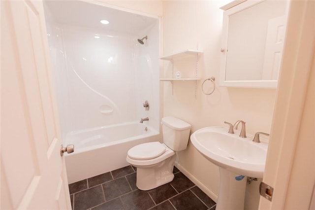 bathroom featuring tile patterned flooring, shower / tub combination, and toilet